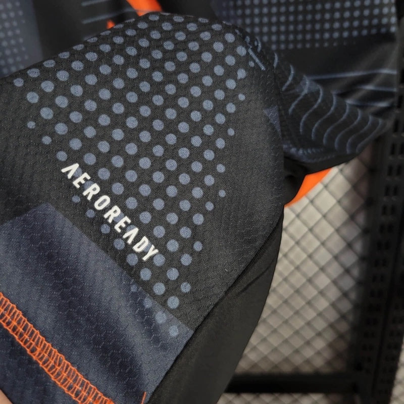 Leazofoot Mexico 2010 away jersey featuring black fabric with blue dot pattern and Aeroready technology detail.