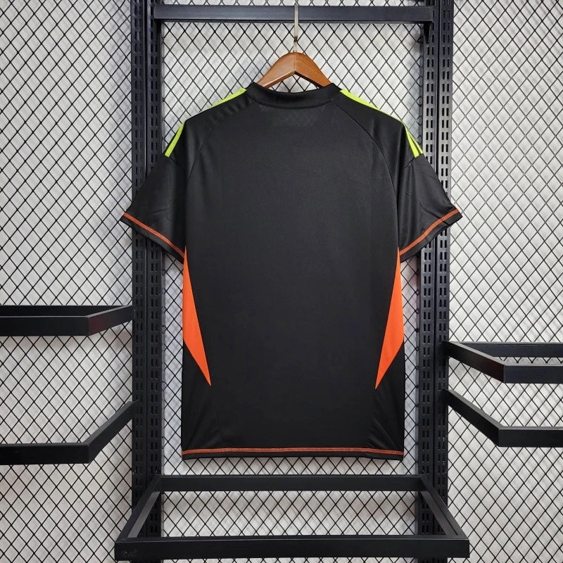 Leazofoot 2010 Mexico away soccer jersey in black with neon yellow shoulder stripes and orange side panels.