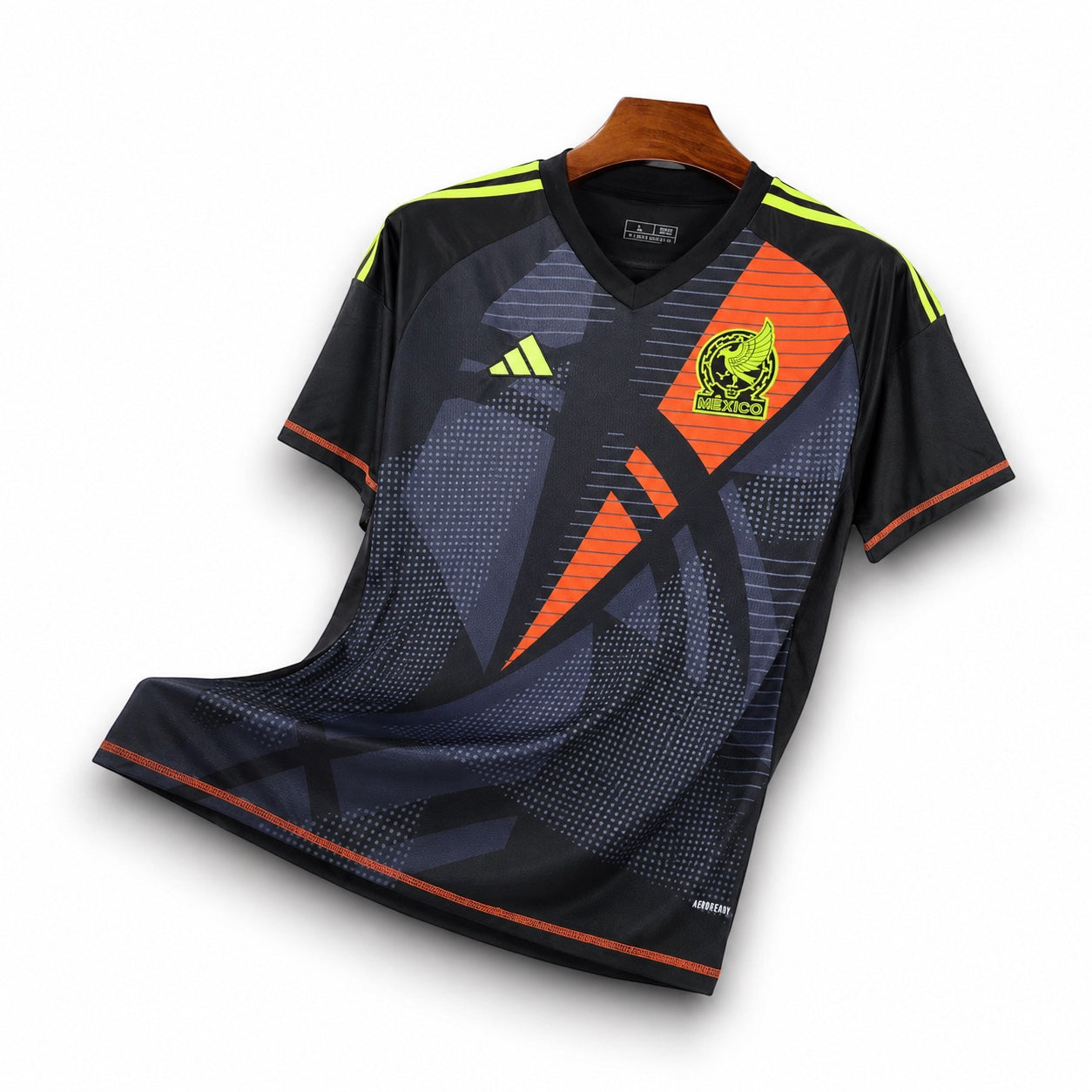 Leazofoot Mexico 2024 goalkeeper jersey in black with orange and neon yellow geometric graphic patterns