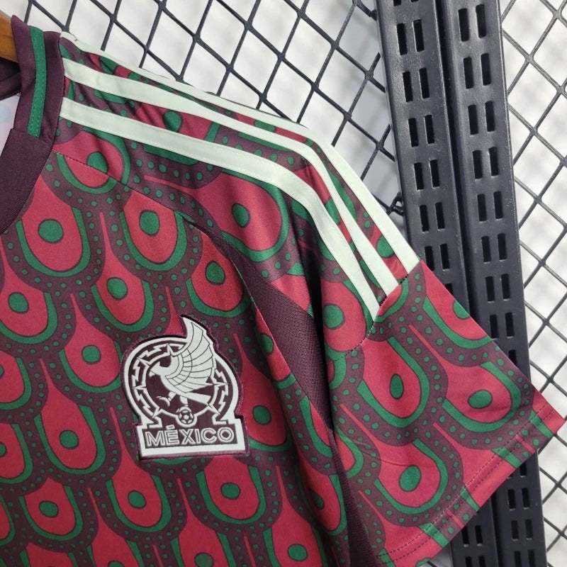 Leazofoot Mexico 2024 home soccer jersey in maroon and green with a patterned design and team crest.