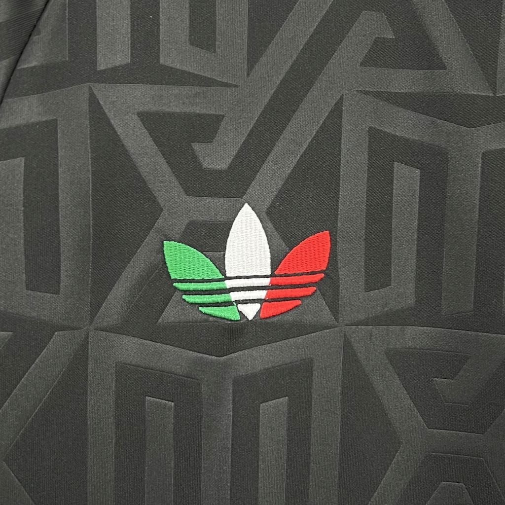 Leazofoot Mexico 2025 away jersey featuring a black geometric pattern and an embroidered tricolor trefoil logo.