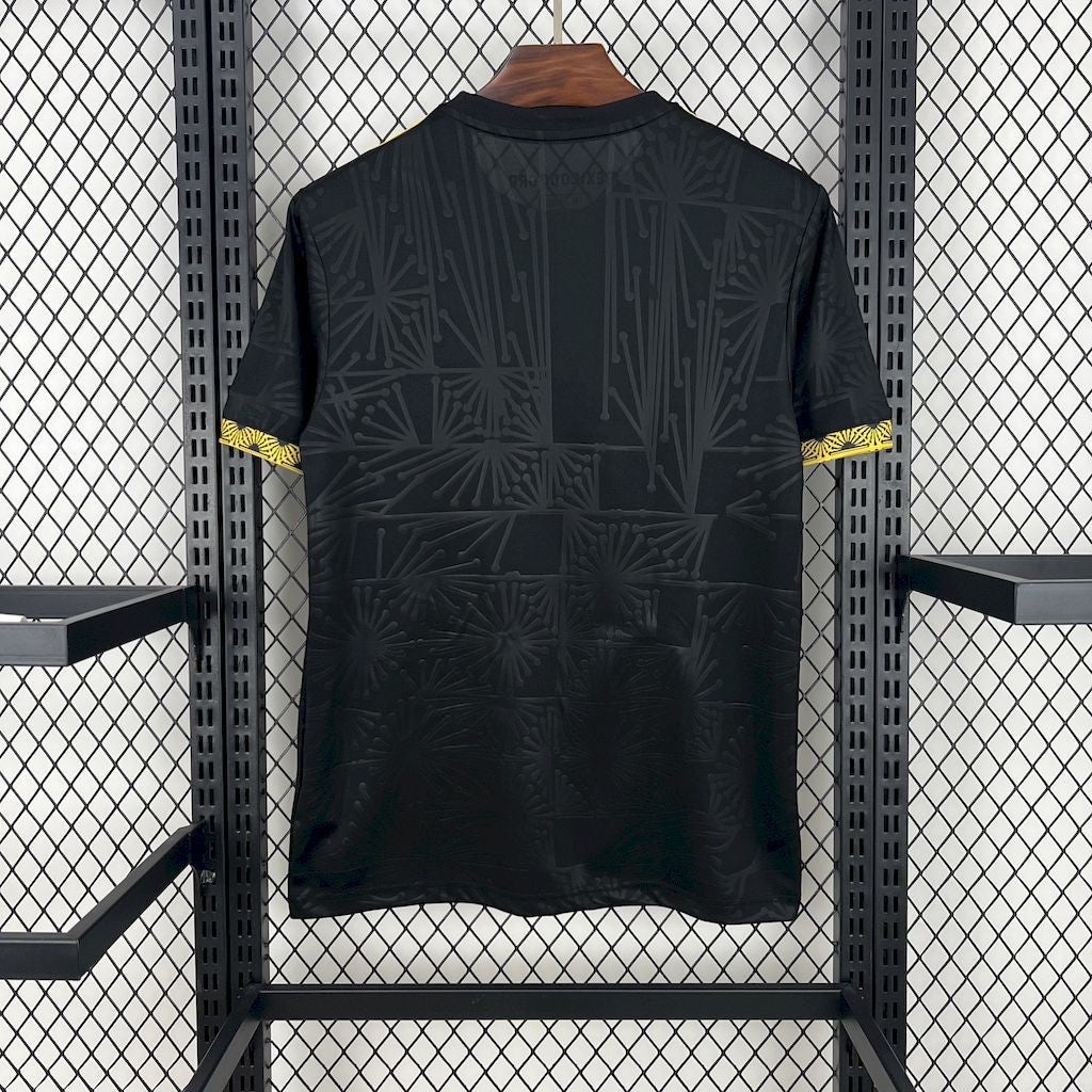 Leazofoot Mexico 2025 concept soccer jersey in black with tonal geometric patterns and yellow sleeve trim details.