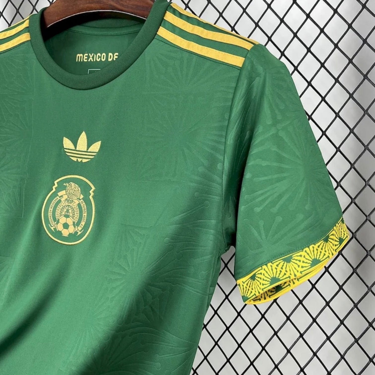Leazofoot Mexico 2025 home soccer jersey in green with gold details, featuring a subtle embossed pattern and crest.
