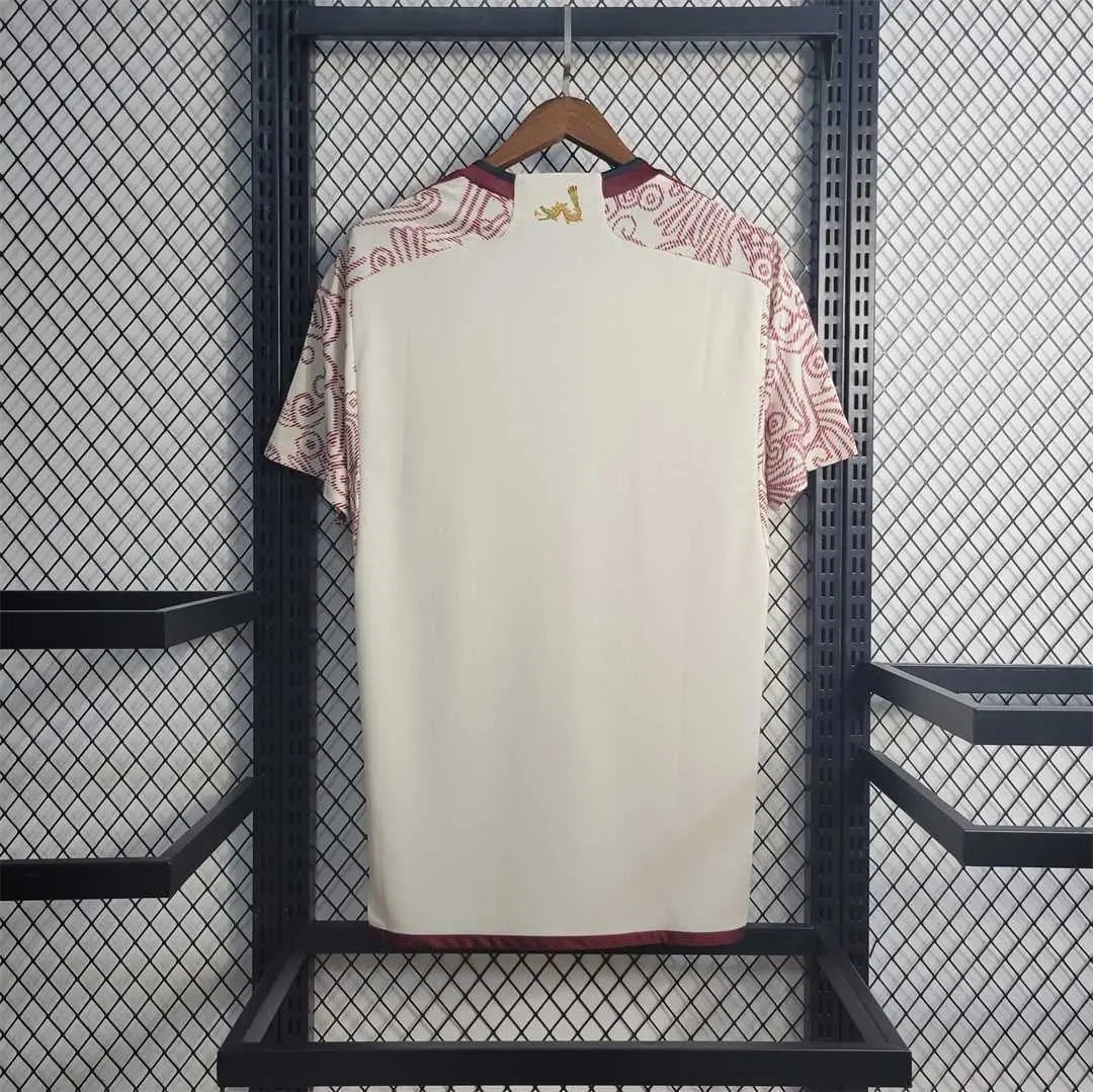 Leazofoot Mexico 24/25 special edition soccer jersey in off-white with patterned sleeves and maroon trim.
