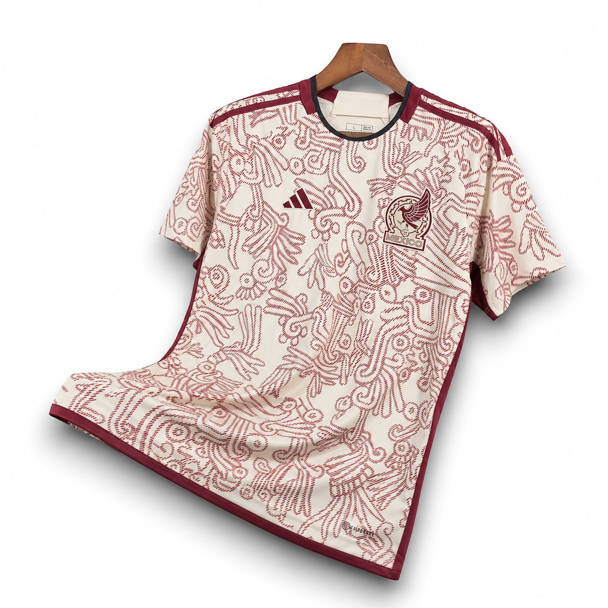 Leazofoot Mexico 24/25 special edition soccer jersey in cream with intricate maroon Aztec-inspired graphic print.
