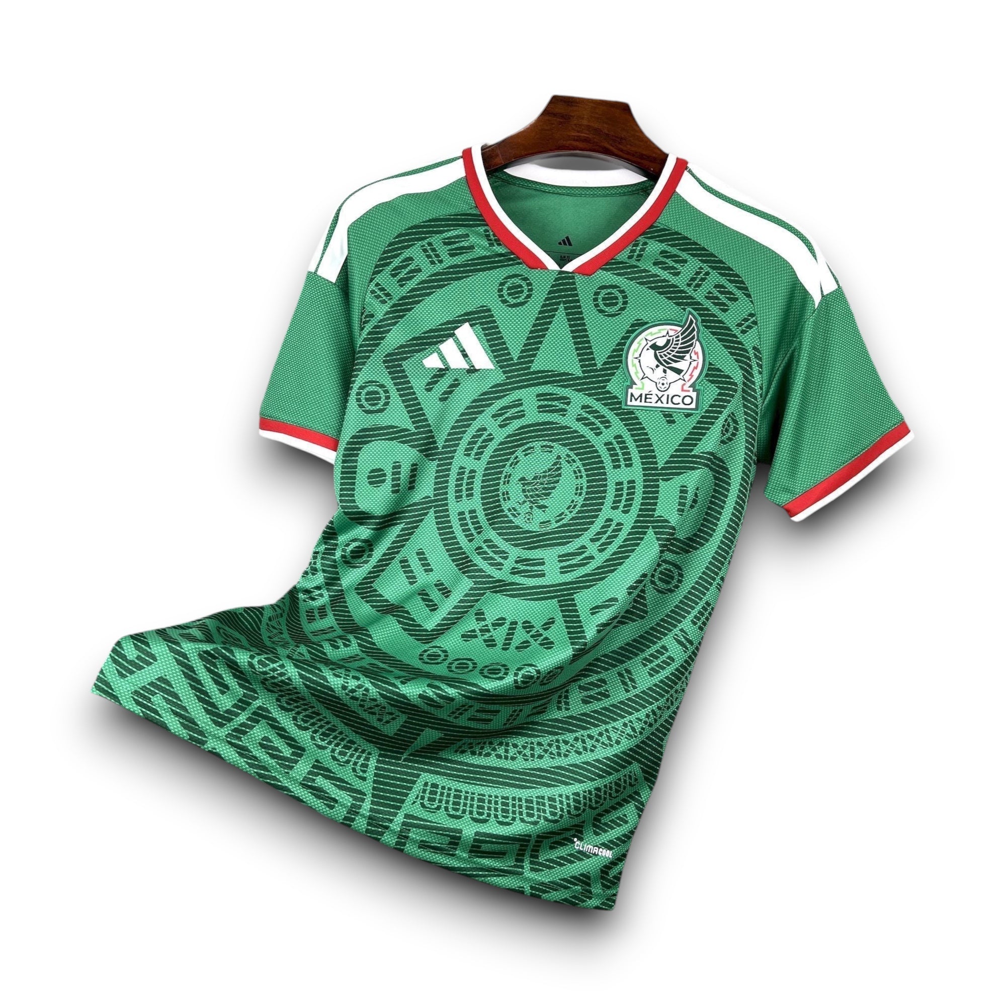 Leazofoot Mexico 2026 home soccer jersey in green with Aztec-inspired patterns and red trim.