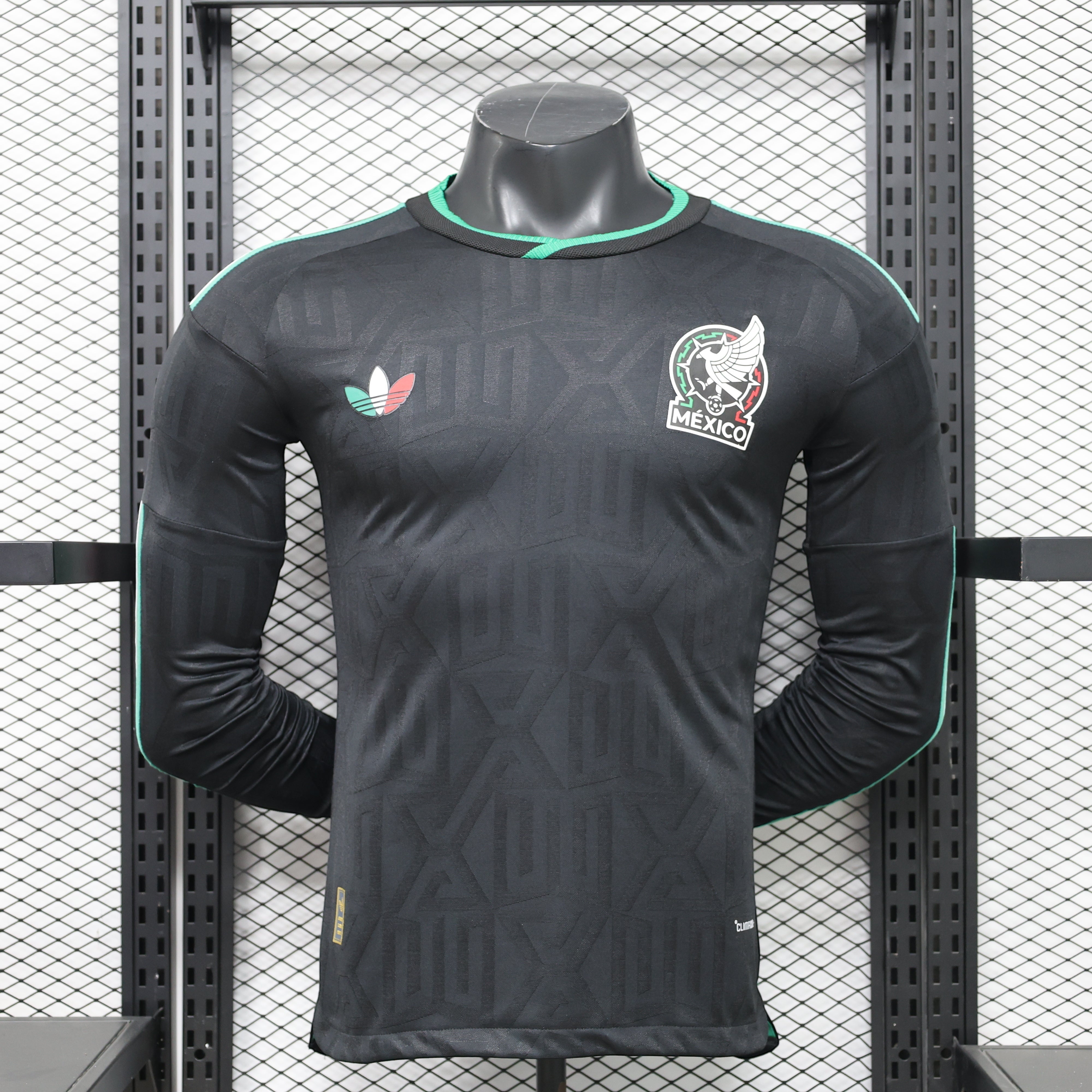 Leazofoot Mexico long sleeve player third jersey 2026, black with green trim and embossed geometric pattern.