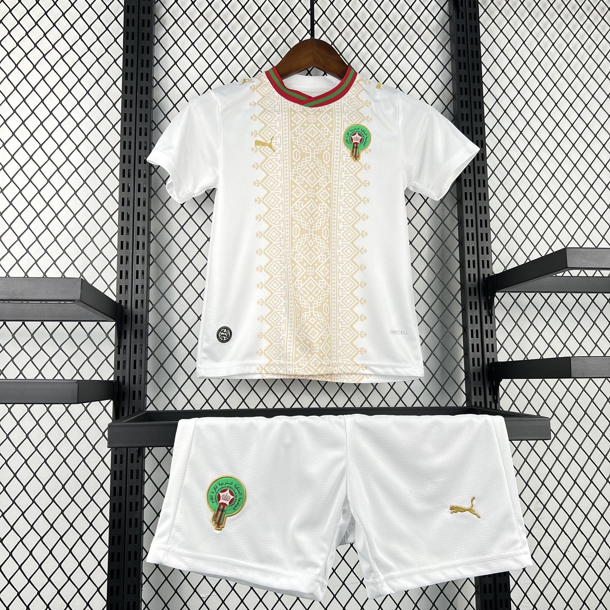Leazofoot white and gold Moroccan football kit for children, featuring a patterned shirt and shorts with team crest.