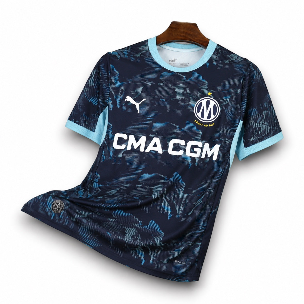 Leazofoot Olympique de Marseille 26/27 away jersey in dark blue with light blue accents and abstract camo pattern.