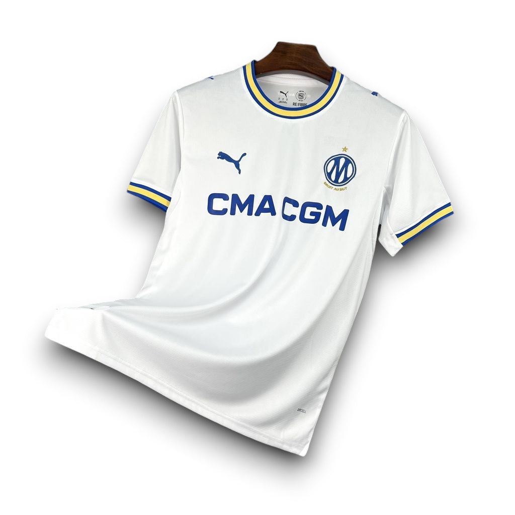 Leazofoot Olympique de Marseille 26/27 home jersey in white with blue and yellow trim and CMA CGM sponsor logo.