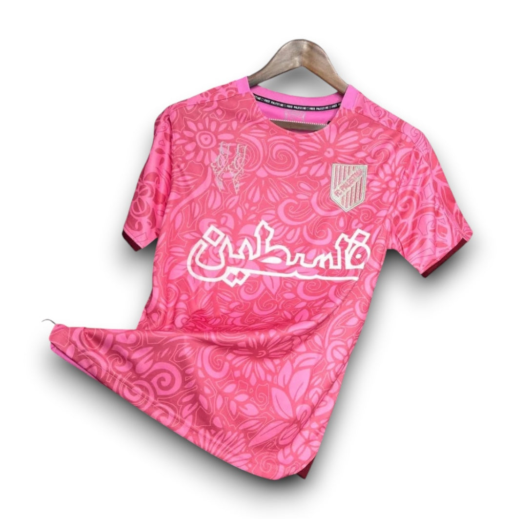 Leazofoot Palestine 2024 concept football jersey in pink with intricate floral patterns and white Arabic calligraphy.