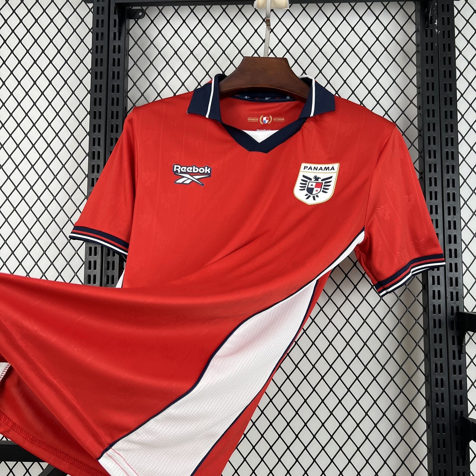 Leazofoot Panama home football jersey 2026, red with white and navy accents, Reebok logo, and team crest.