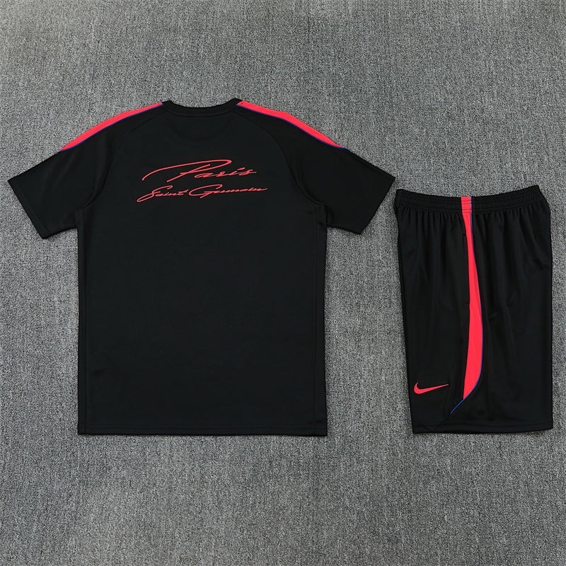 Leazofoot Paris Saint Germain 26/27 training kit in black with red and blue accents, featuring a script logo on the shirt.
