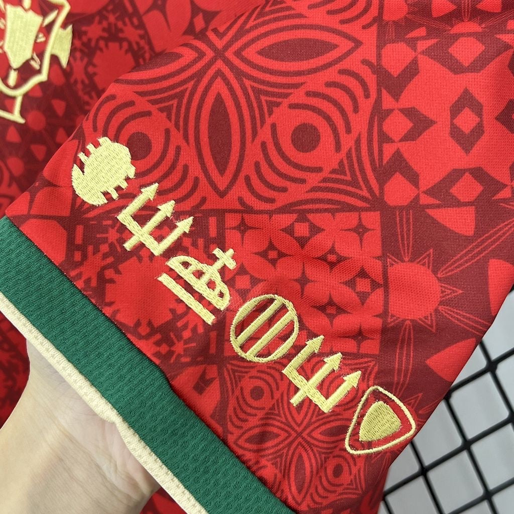 Leazofoot Portugal 2024 special edition football jersey featuring red patterned fabric and gold embroidered details.