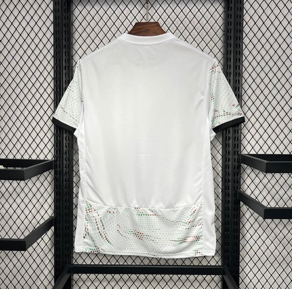 Leazofoot Portugal 2025 away football jersey in white with patterned green and red accents on sleeves and hem.
