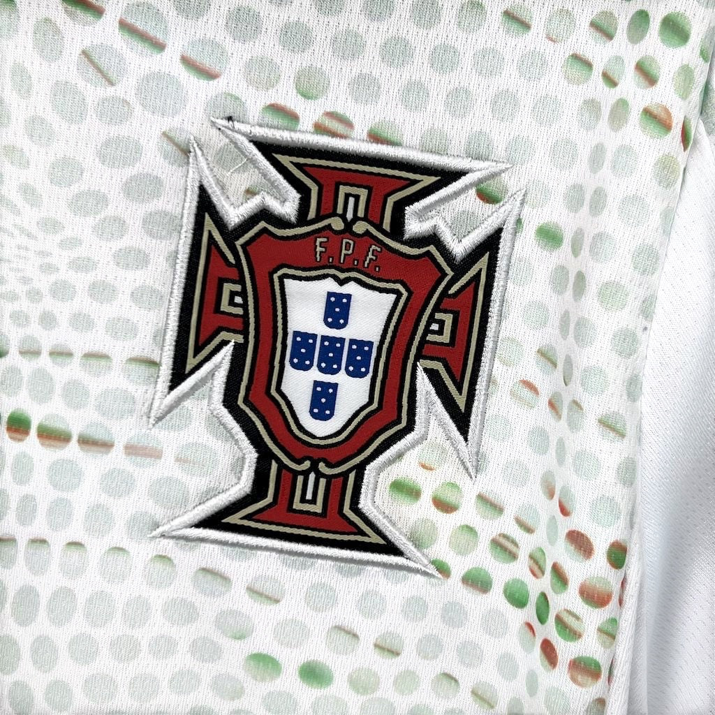 Leazofoot Portugal 2025 long sleeve away jersey featuring a detailed embroidered FPF crest on a white dotted pattern.