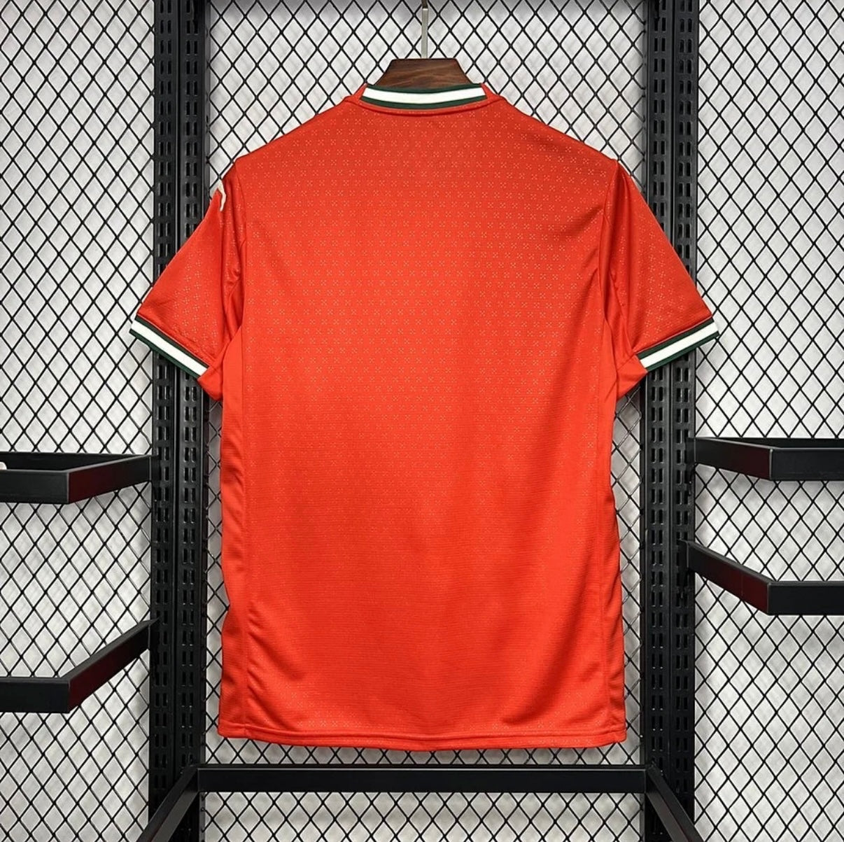 Leazofoot Portugal 2025 home jersey in red with green and white collar and sleeve trim details.