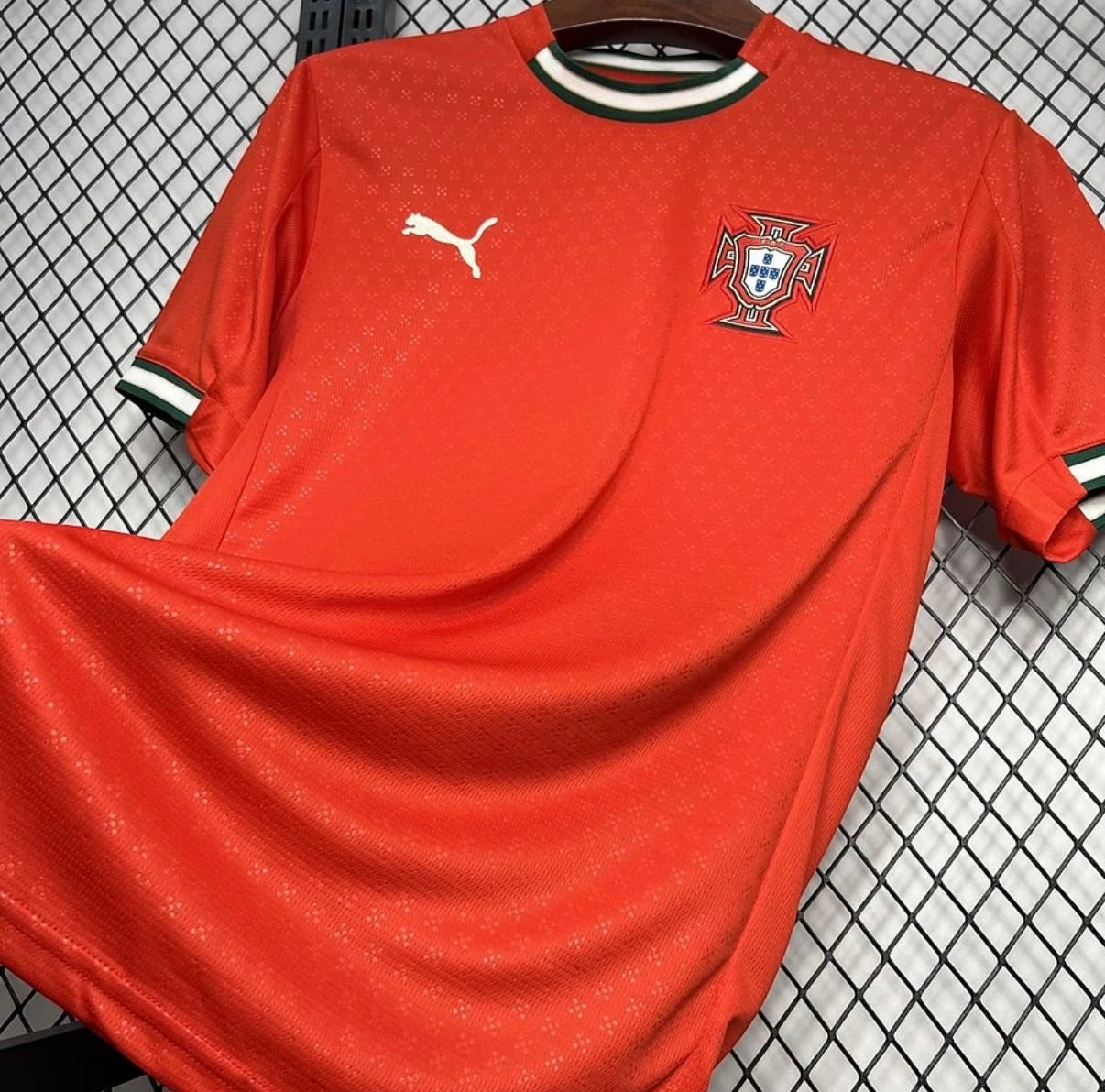 Leazofoot Portugal 2025 home soccer jersey in red with green and white trim, featuring team crest and logo.