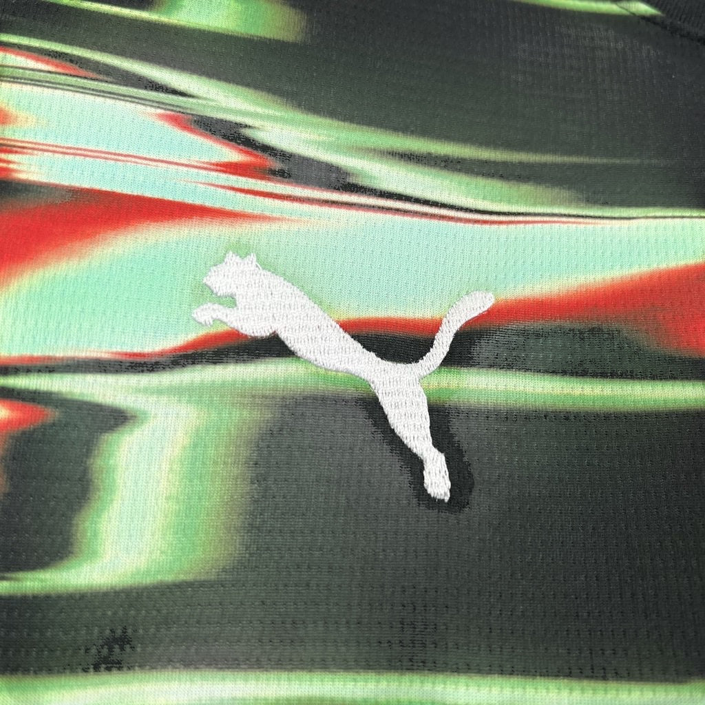 Leazofoot Portugal 2025 pre-match jersey featuring a black, green, and red abstract pattern with white Puma logo.
