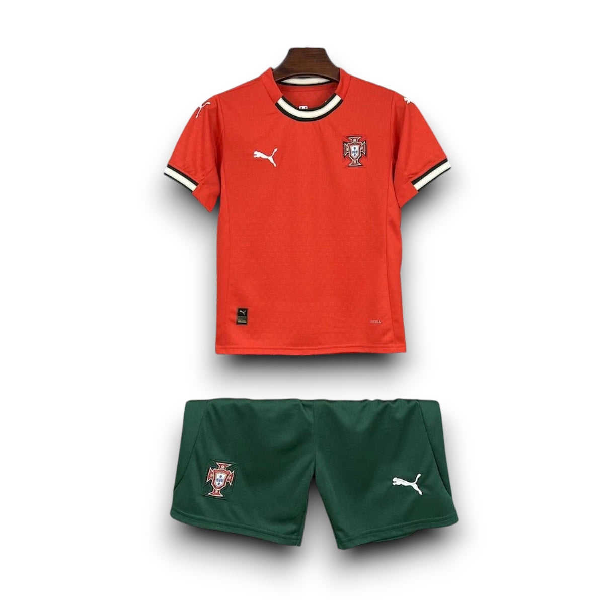 Leazofoot Portugal 2025 kids home kit featuring a red jersey with white trim and green shorts with team crest.