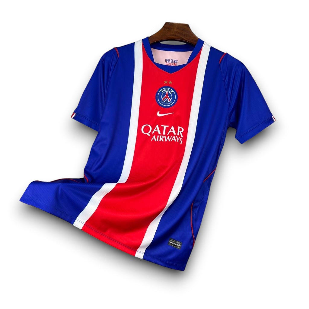 Leazofoot Paris Saint Germain 26/27 home jersey in blue, red, and white with team crest and Qatar Airways sponsor logo.