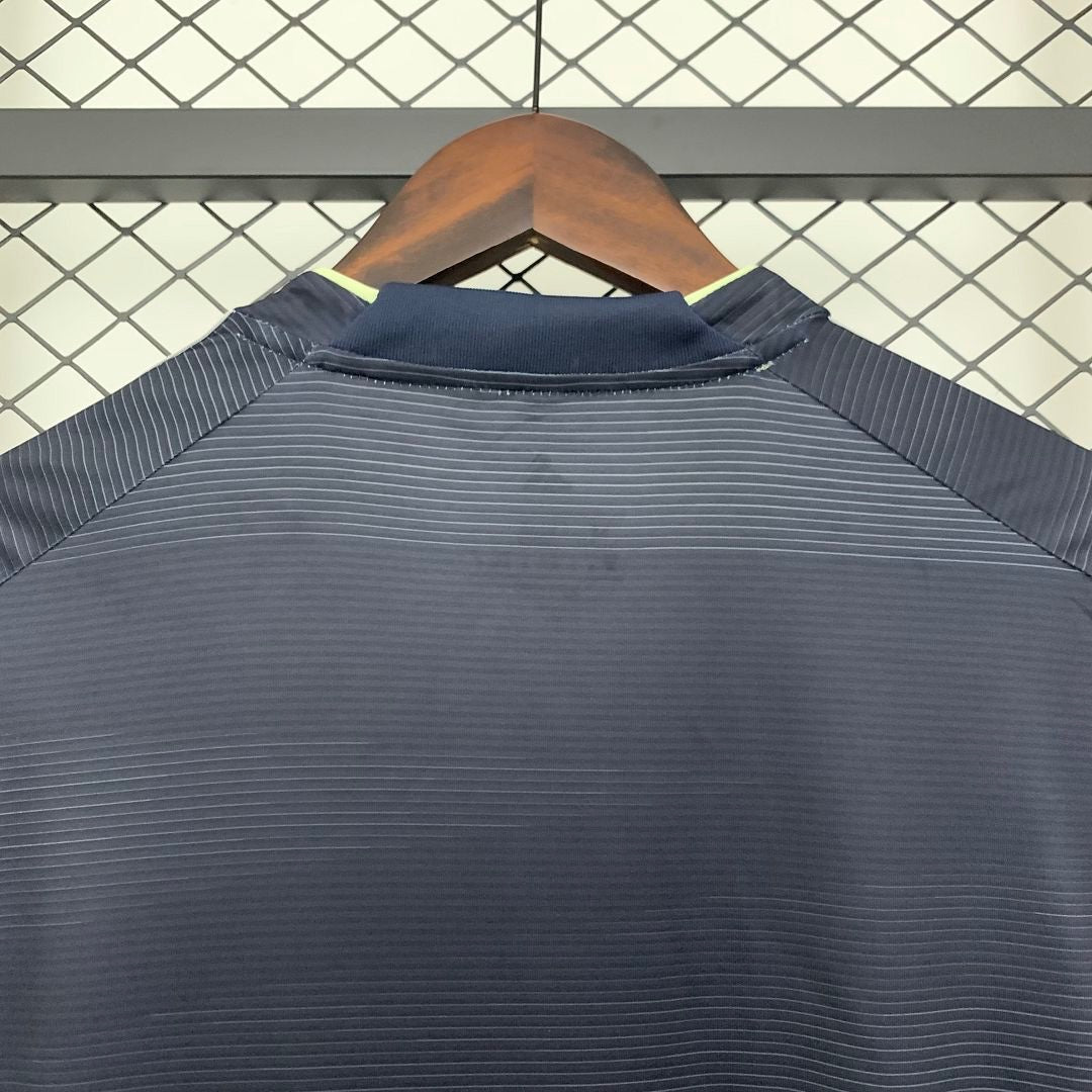 Leazofoot Real Madrid 2025-2026 away jersey back view in dark navy with subtle horizontal pinstripes and neon trim