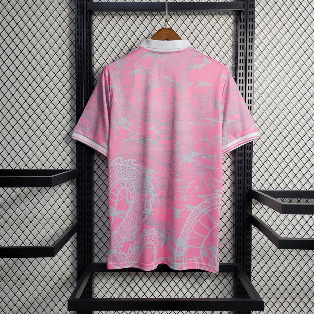 Leazofoot Real Madrid 23/24 special edition pink football jersey with white dragon pattern and collar, back view.