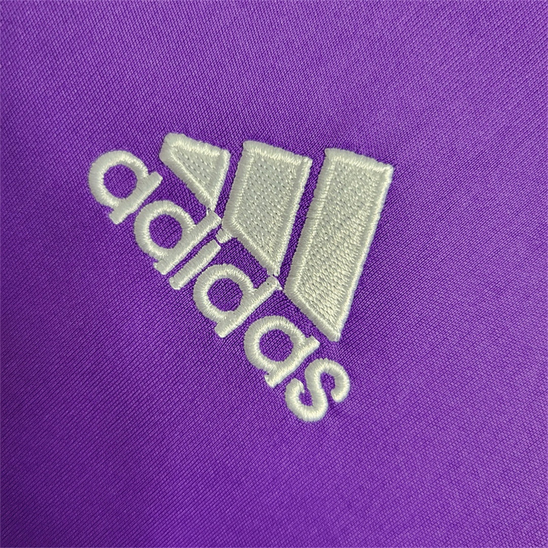 Leazofoot Real Madrid 16/17 away jersey featuring a white embroidered Adidas logo on a purple fabric background.
