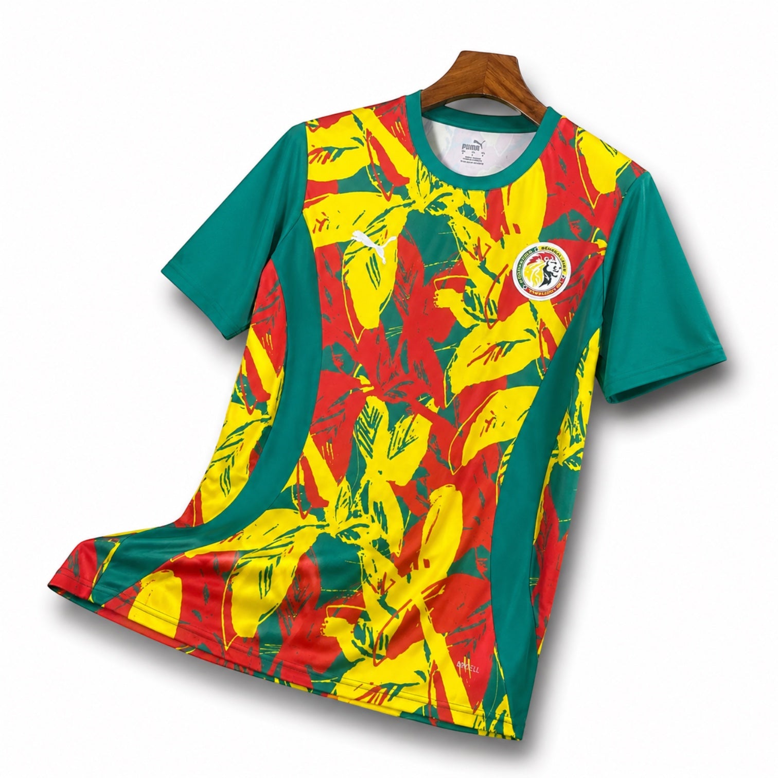 Leazofoot Senegal 24/25 special edition football jersey featuring a vibrant red, yellow, and green leaf pattern.