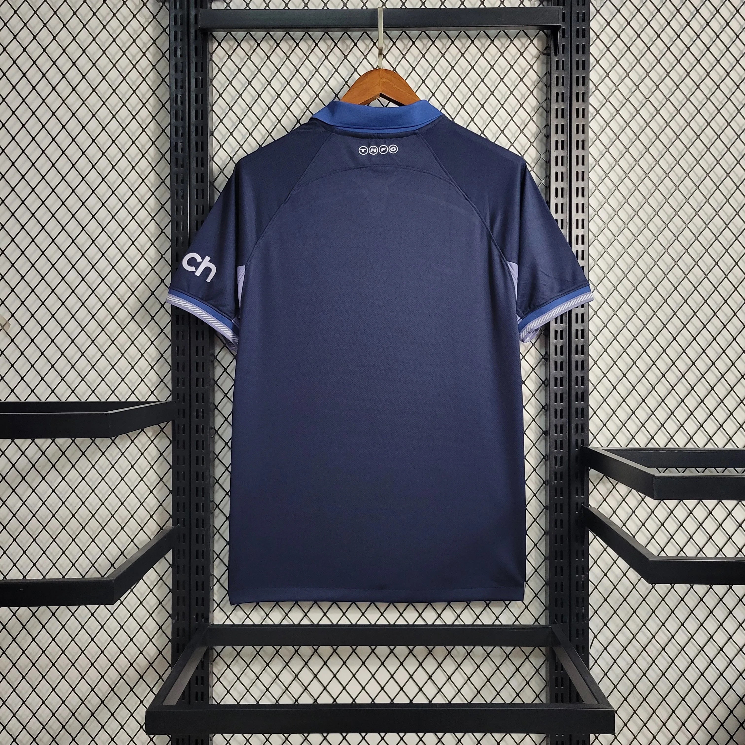Leazofoot Tottenham 23/24 men's navy blue football jersey with white "ch" logo on sleeve.