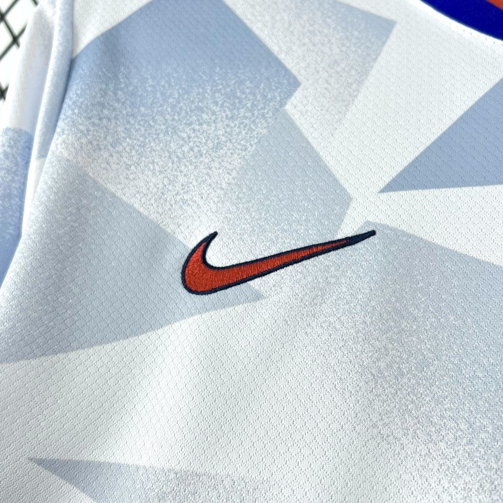 Leazofoot 2025 USA home soccer jersey in white with a geometric pattern and embroidered red and blue Nike swoosh