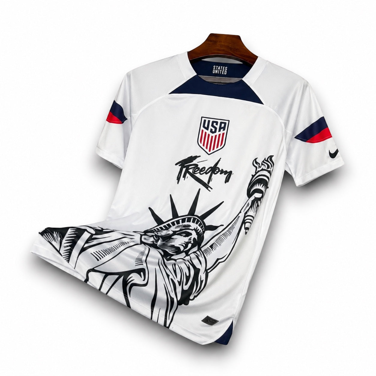 Leazofoot USA 2025 concept soccer jersey in white with Statue of Liberty graphic and Freedom script print.