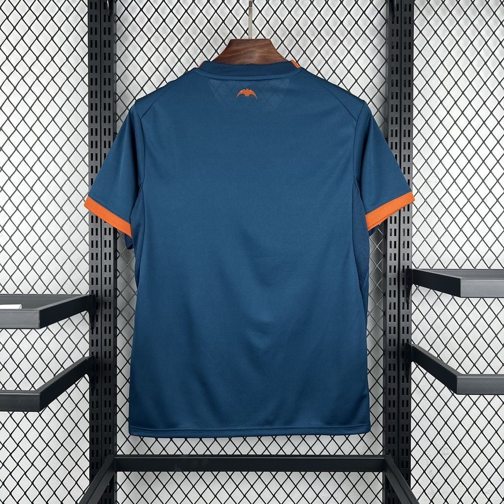 Leazofoot Valencia CF 2026-2027 away jersey in dark blue with orange sleeve cuffs and small bat logo on the back neck.