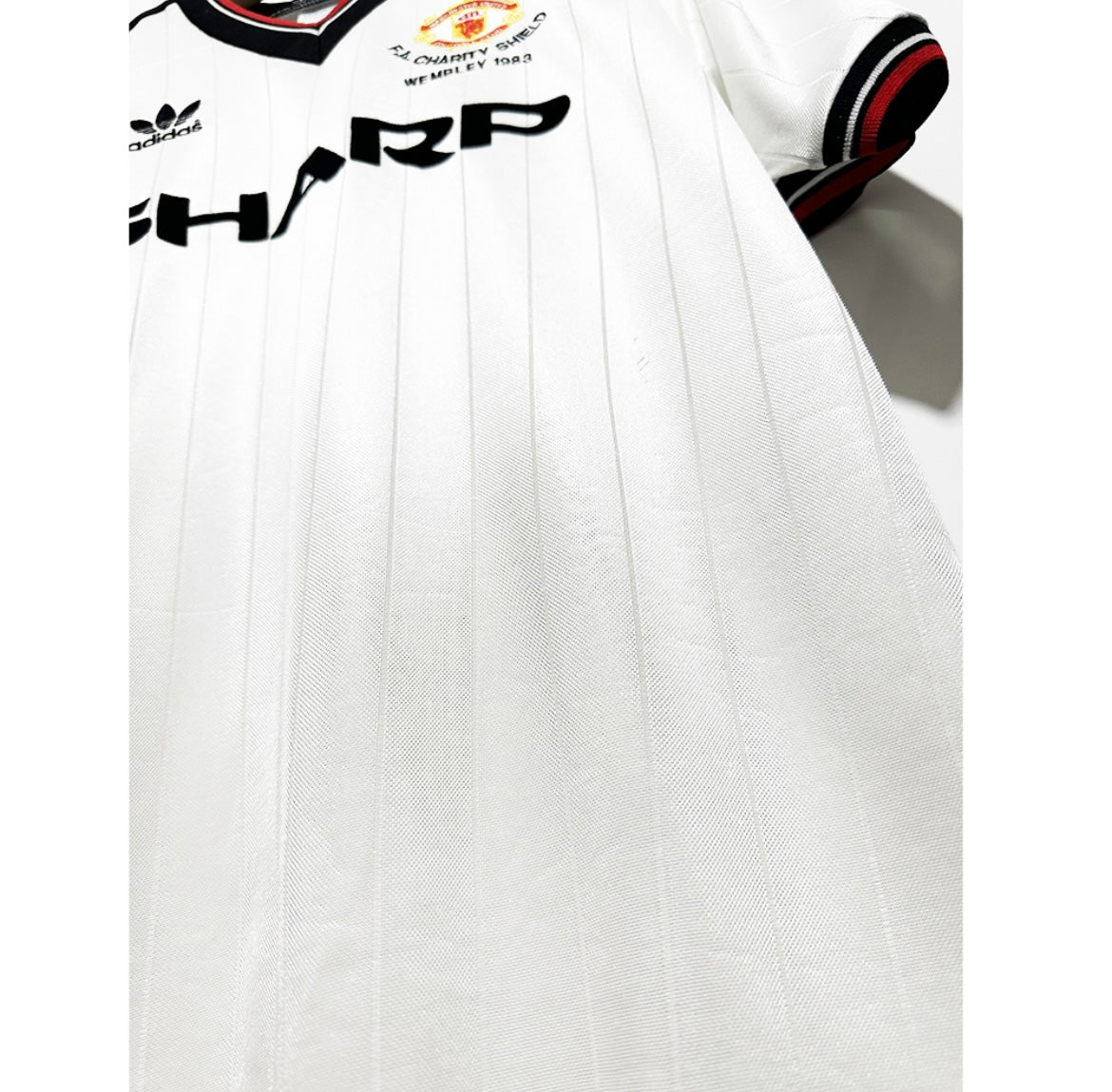 MANCHESTER UNITED - MAILLOT EXTÉRIEUR 1982/83