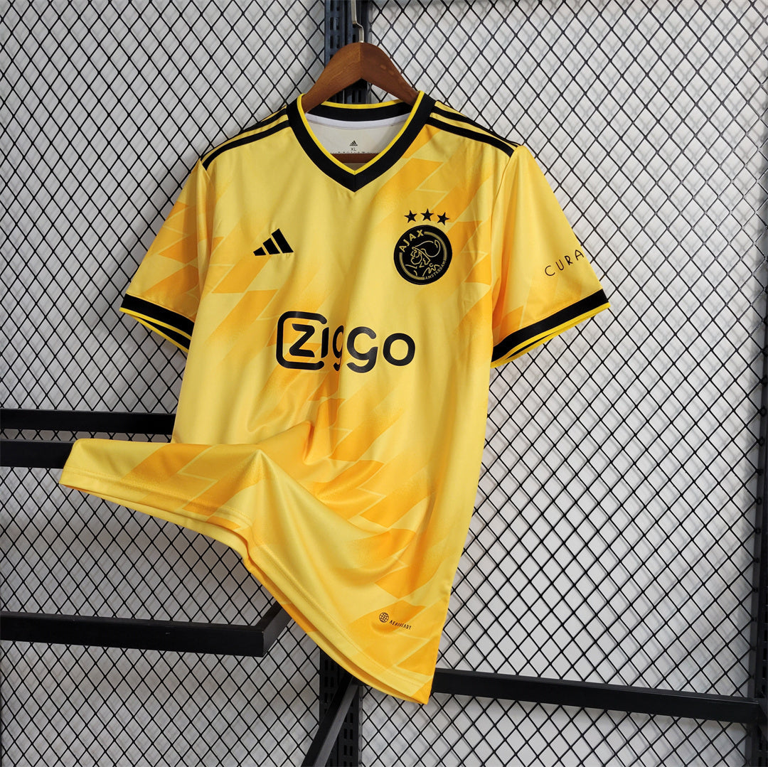 AJAX - MAILLOT EXTÉRIEUR 23/24