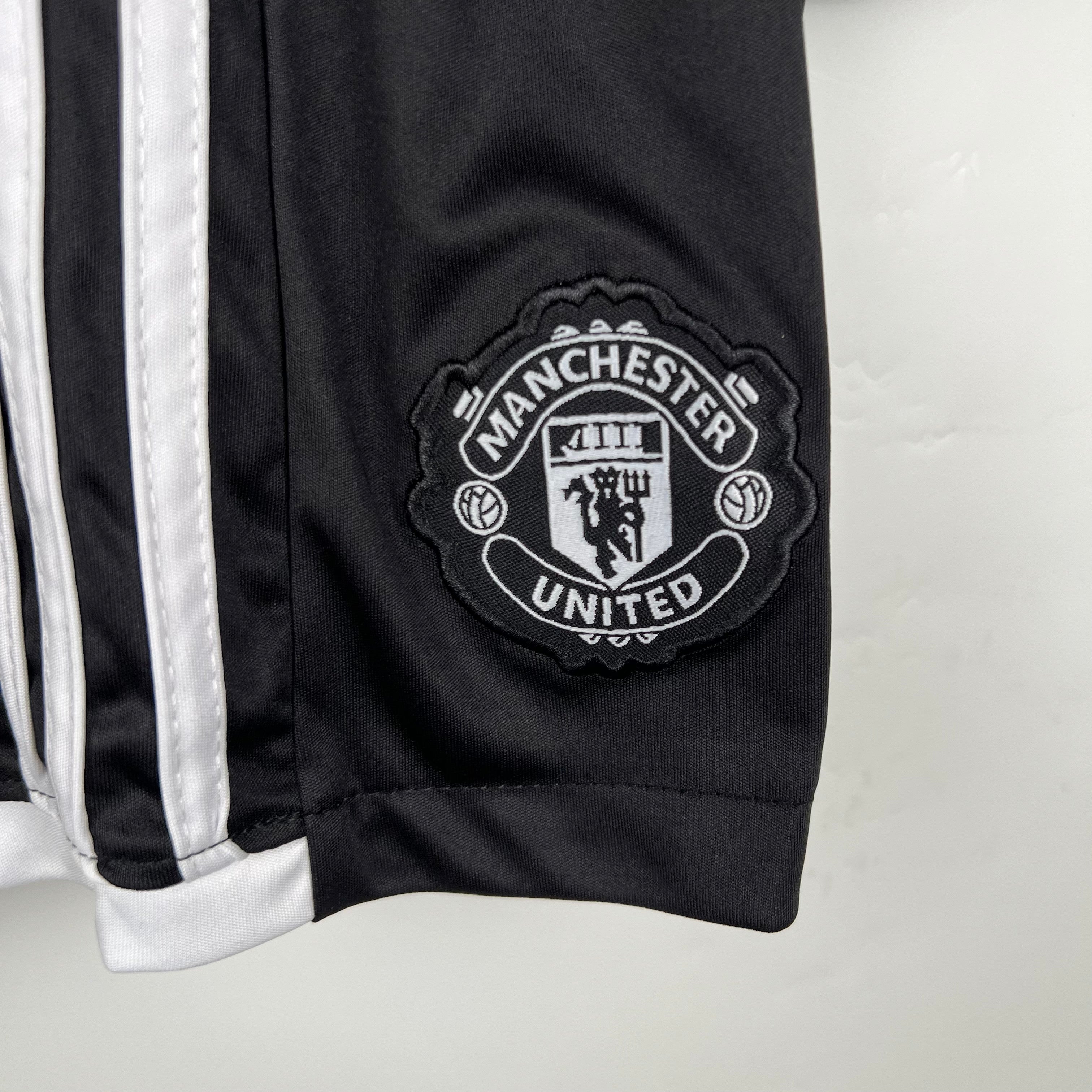 MANCHESTER UNITED - ENSEMBLE ENFANT EXTÉRIEUR 23/24