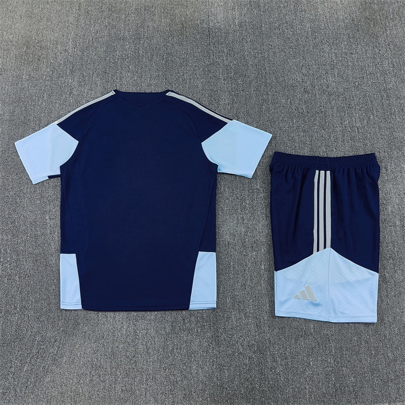 Leazofoot Ajax 26/27 training set featuring a navy and light blue performance t-shirt and matching athletic shorts.