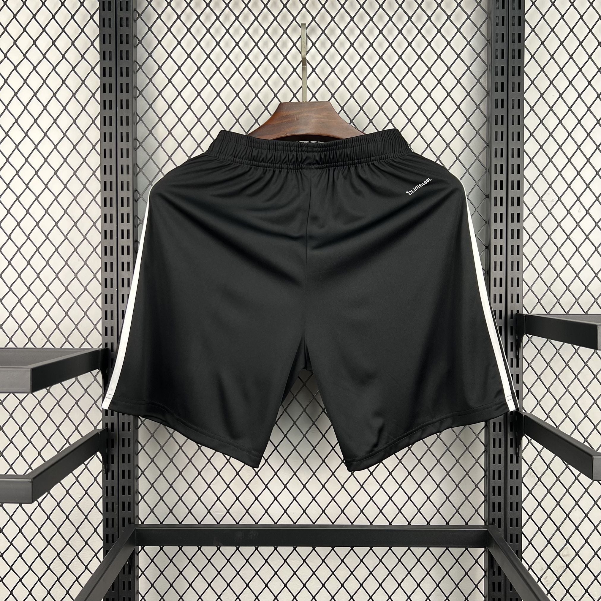 Leazofoot Argentine black athletic shorts with white side stripes and elastic waistband.