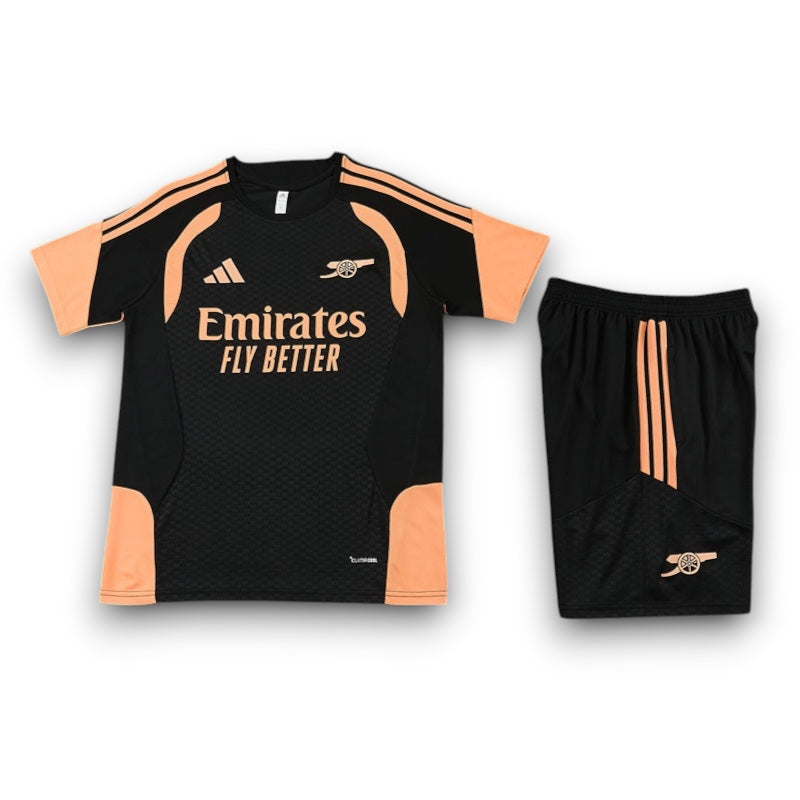 Leazofoot Arsenal 26/27 training kit featuring a black and orange jersey and matching shorts with club branding.