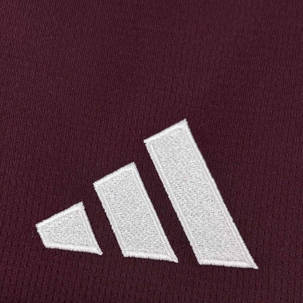 Leazofoot Aston Villa 26/27 home jersey featuring a white embroidered logo on a textured claret performance fabric.
