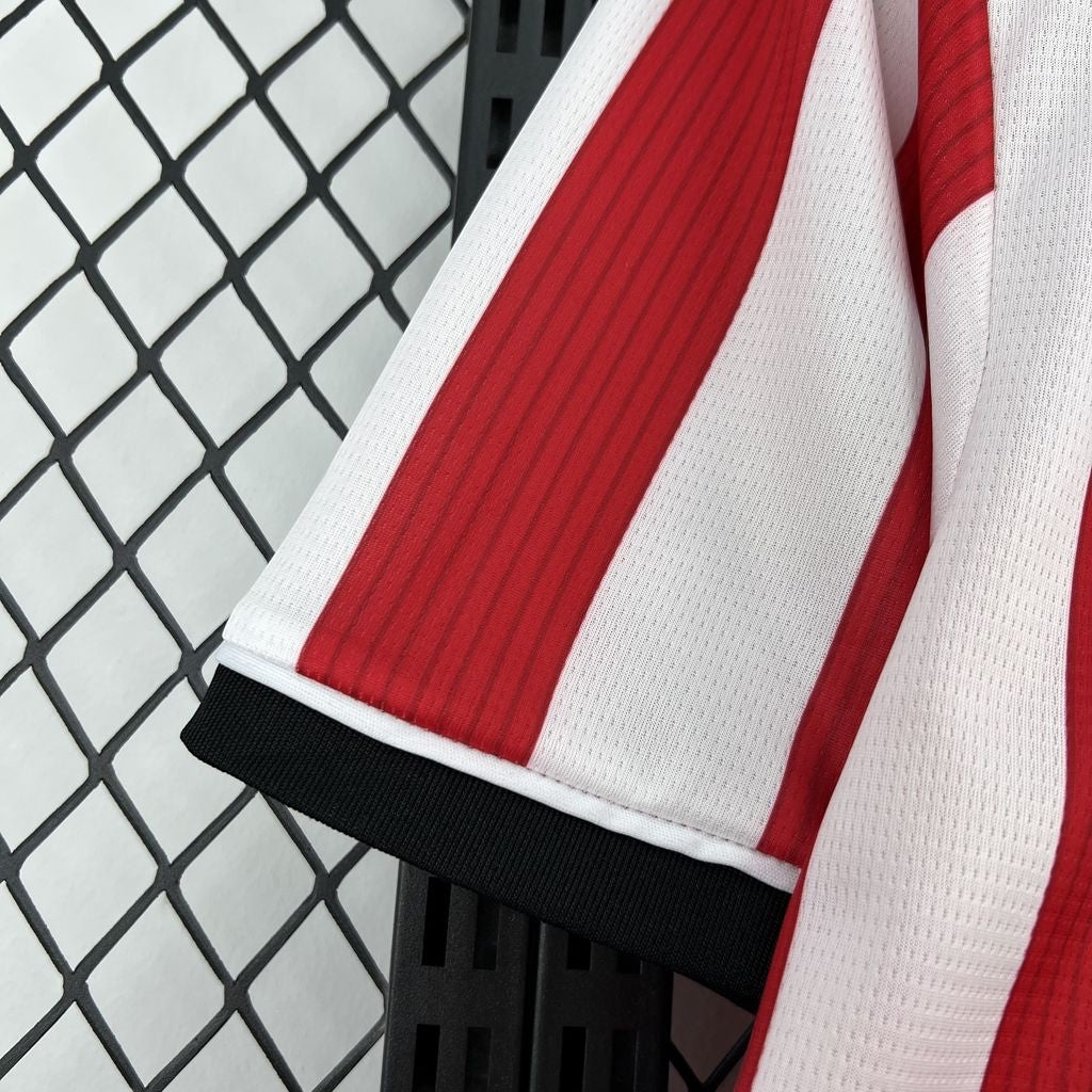 Leazofoot Athletic Bilbao 26/27 home jersey featuring red and white vertical stripes and a black sleeve cuff.