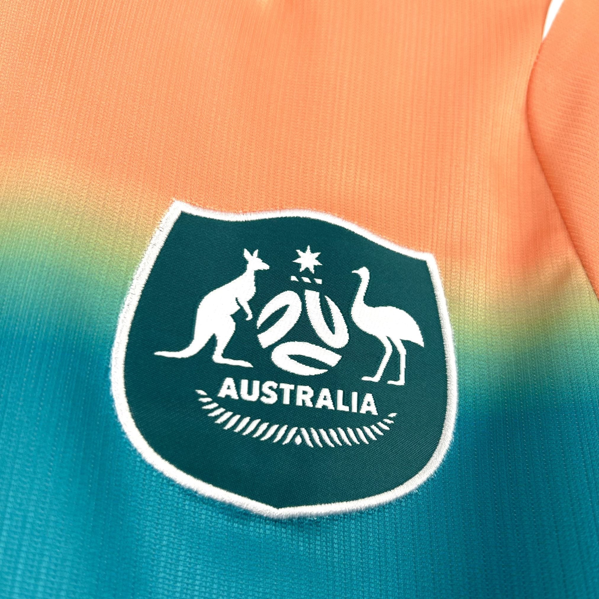 Leazofoot Australia 2026 away jersey with kangaroo and emu crest, featuring an orange to teal gradient.