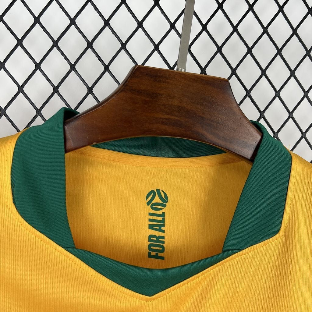 Leazofoot Australia 2026 home soccer jersey, yellow with green collar and "FOR ALL" text inside.