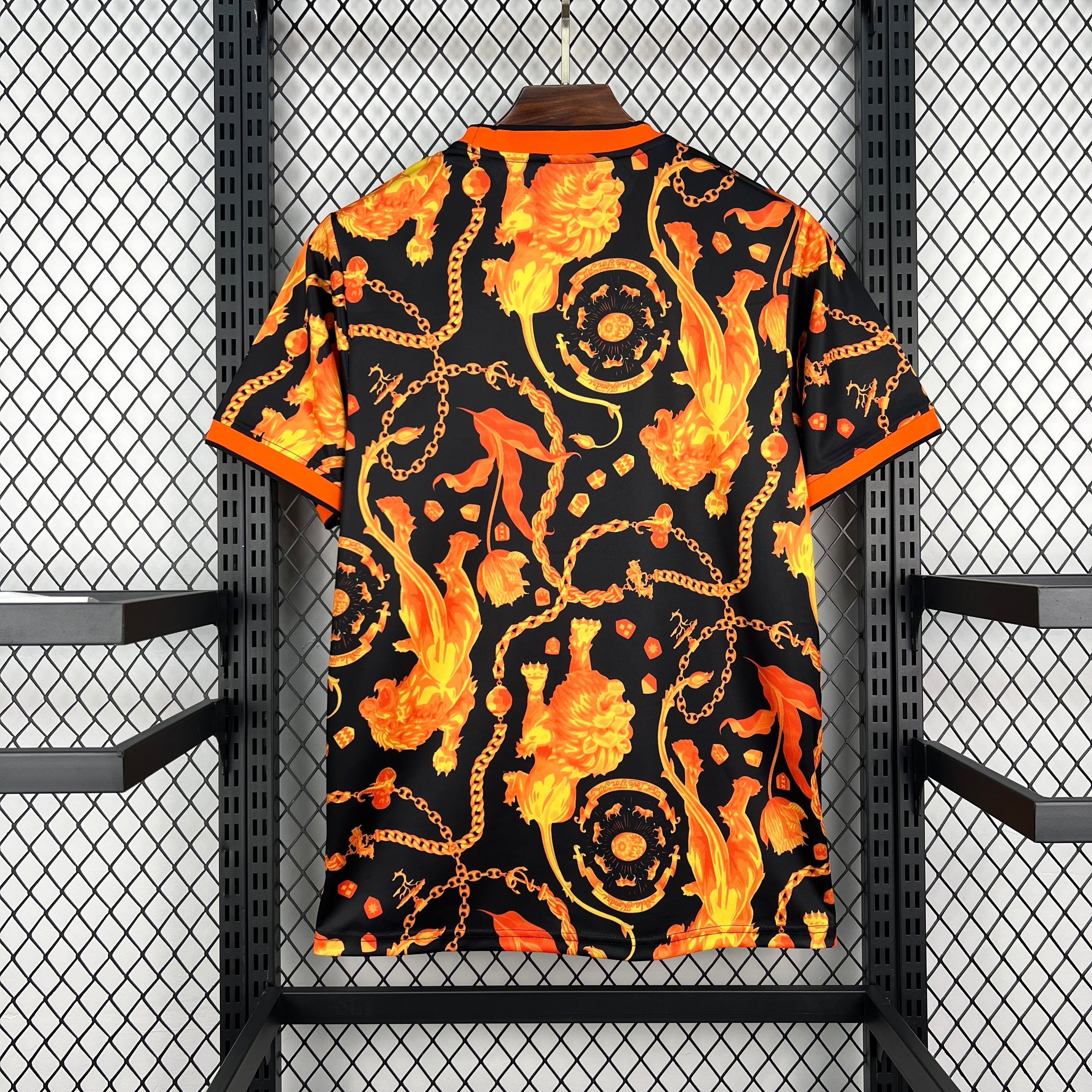 Leazofoot black and orange short-sleeve soccer jersey with a bold lion and chain print. Crew neck.