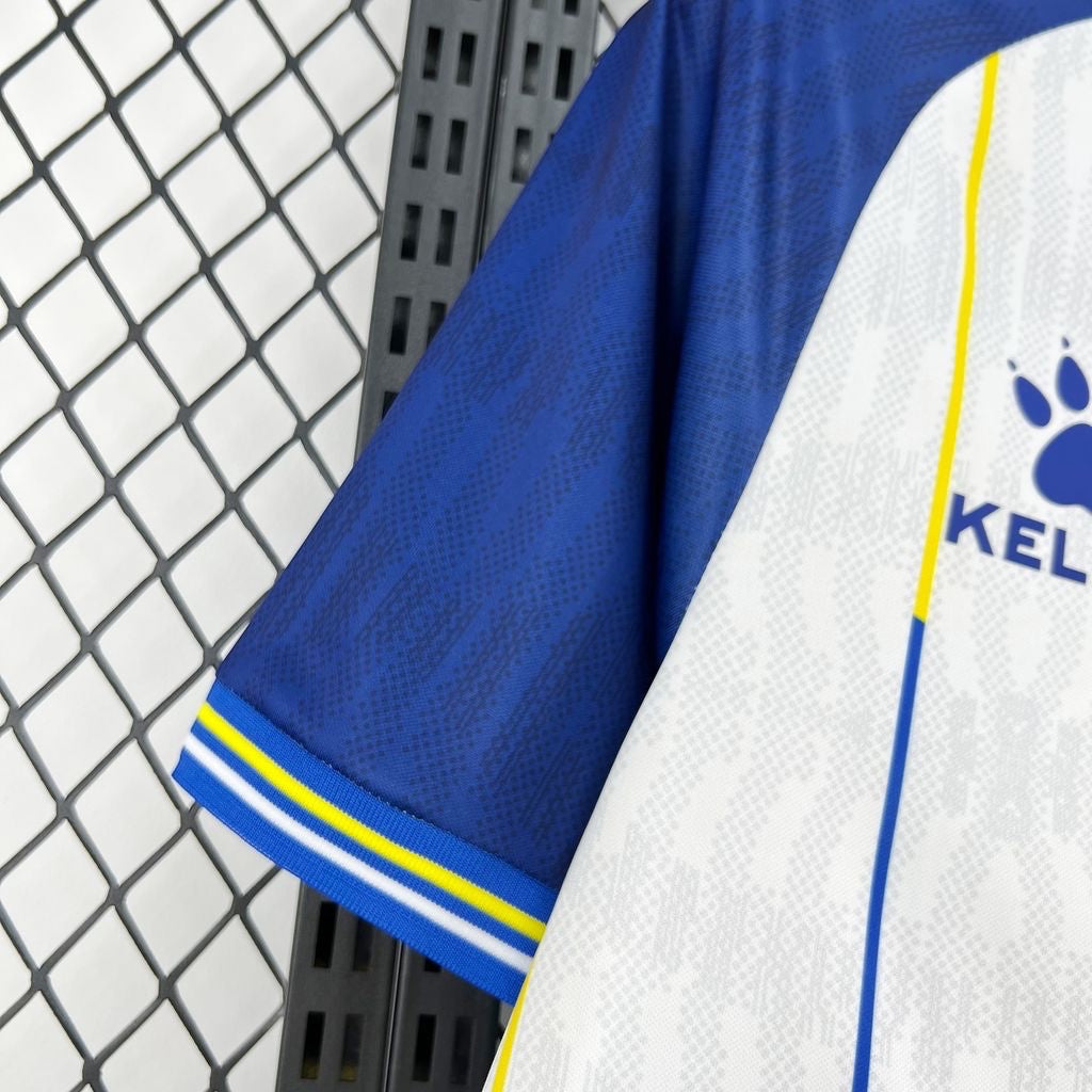 Leazofoot BOSNIE 2026 away jersey in blue with yellow and white trim on the sleeves.