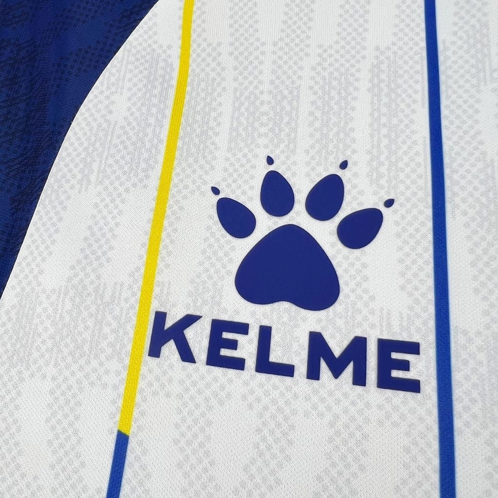Leazofoot BOSNIE 2026 away jersey with blue and yellow accents and a white textured pattern.