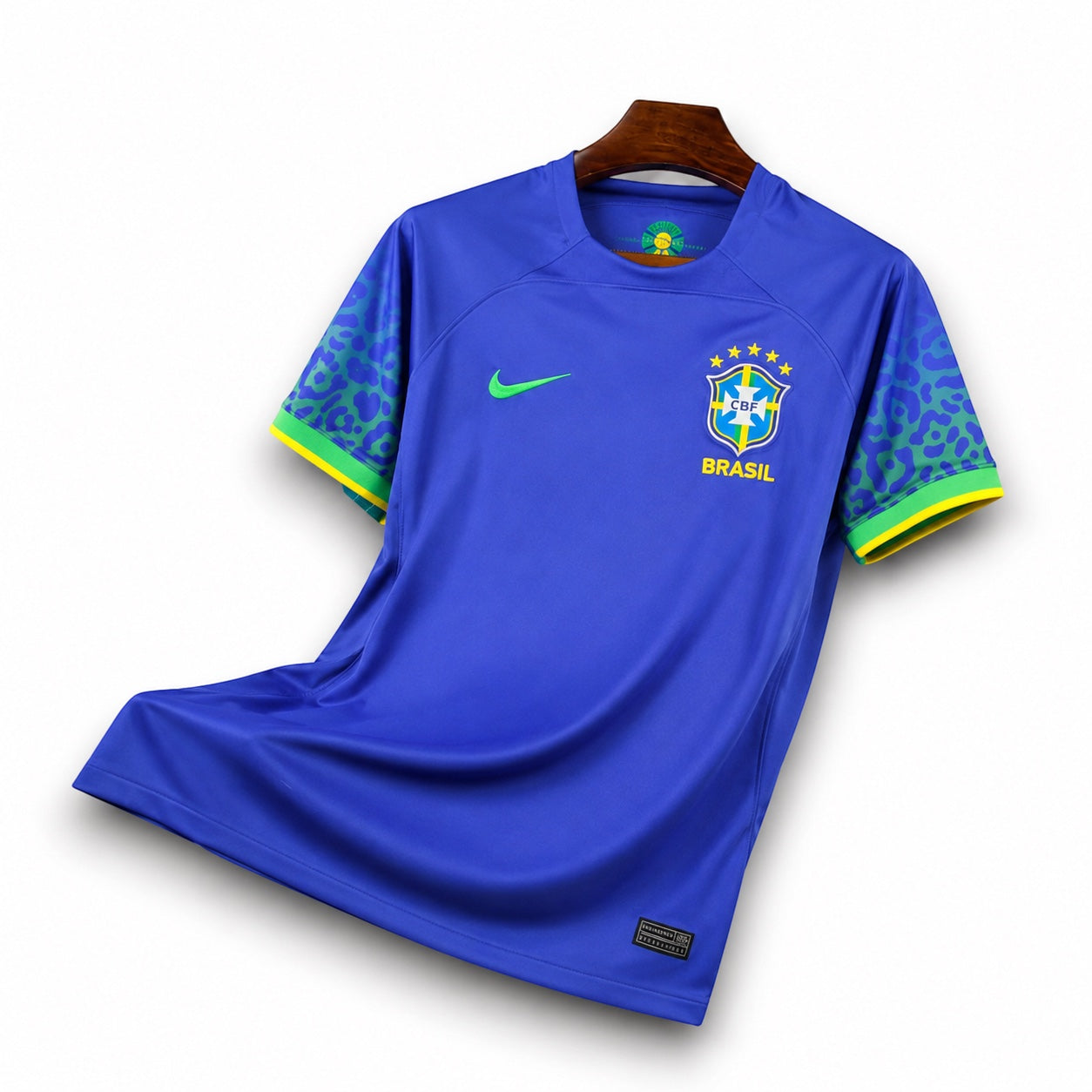Leazofoot 2022 Brazil away soccer jersey in blue with green leopard print sleeves and yellow trim.