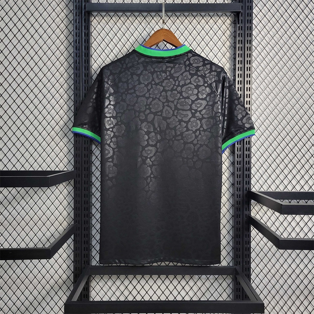 Leazofoot black Brazil 2023 concept soccer jersey with a subtle tonal leopard print pattern and green blue trim.