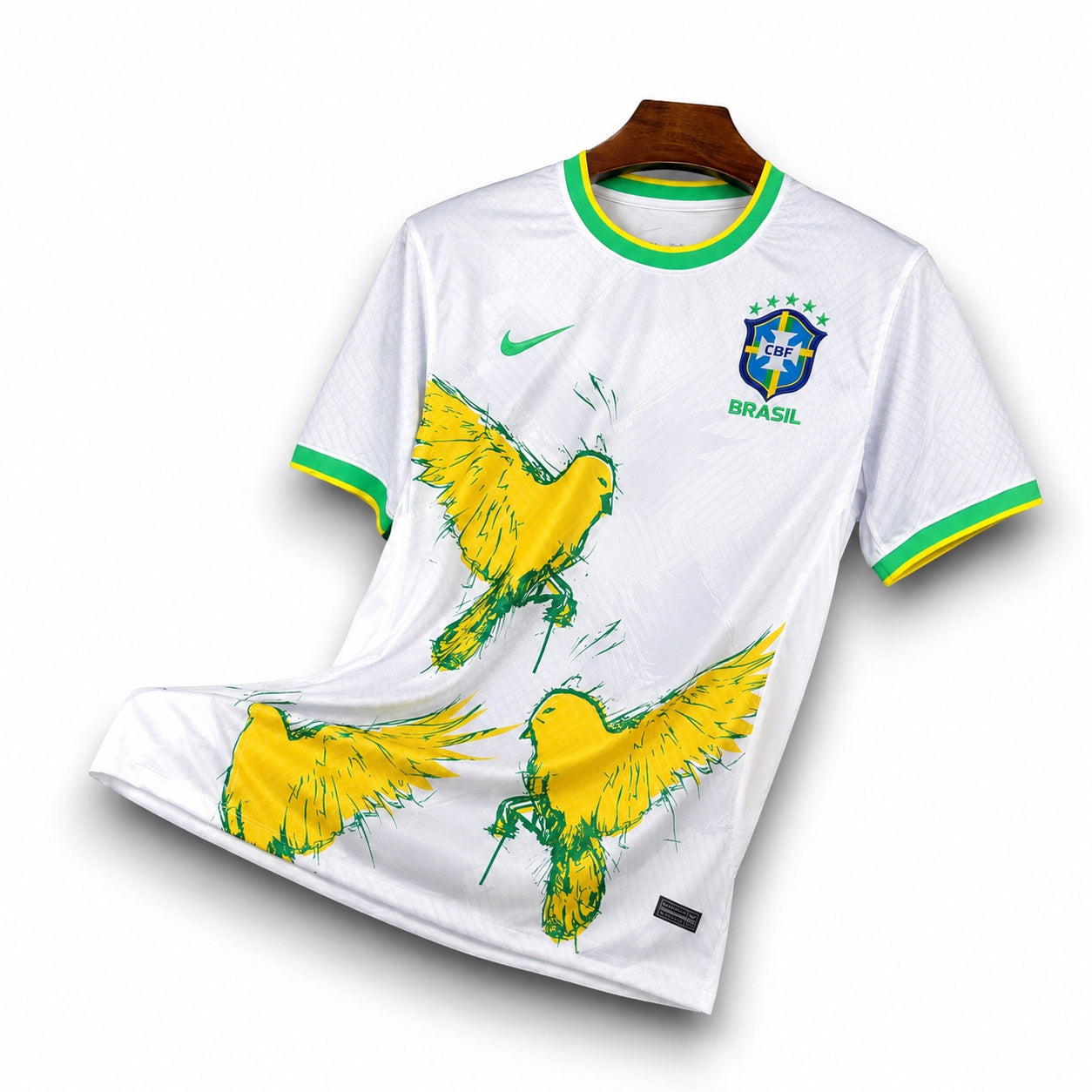 Leazofoot Brazil 2024 concept soccer jersey in white with yellow bird graphics, green trim, and team crest.