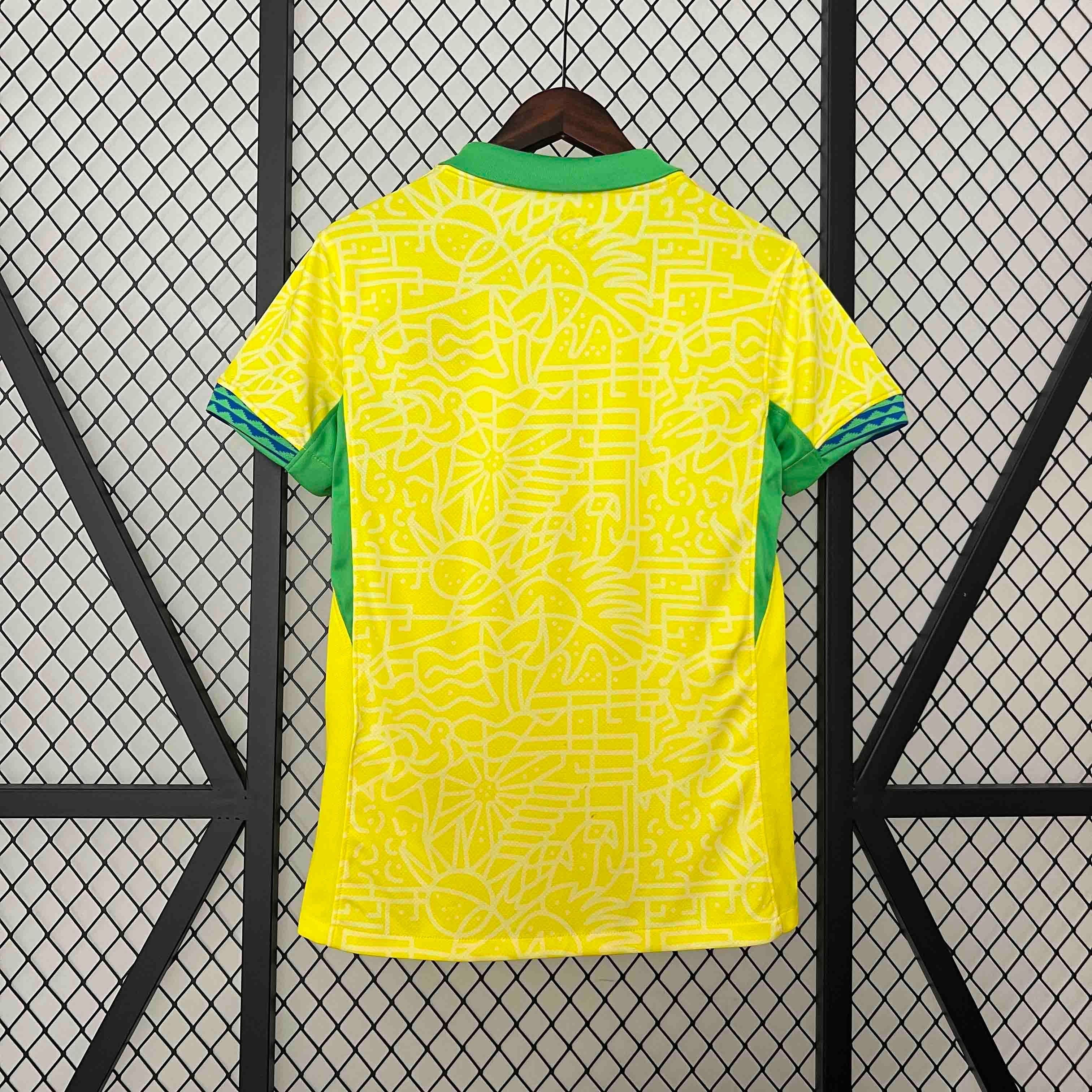 Leazofoot Brazil 2024 home soccer jersey in yellow with green trim and intricate white geometric graphic pattern.